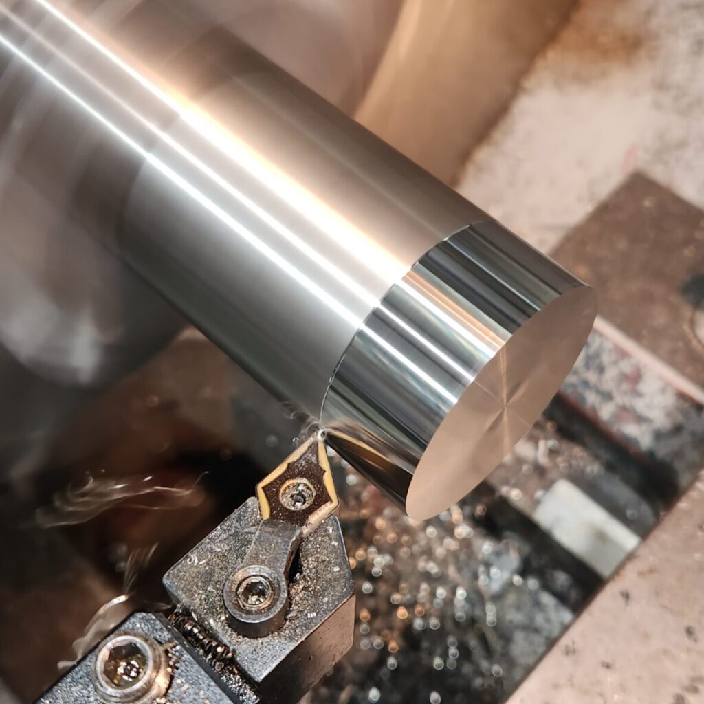 Aluminum protoype being worked on in cnc machine